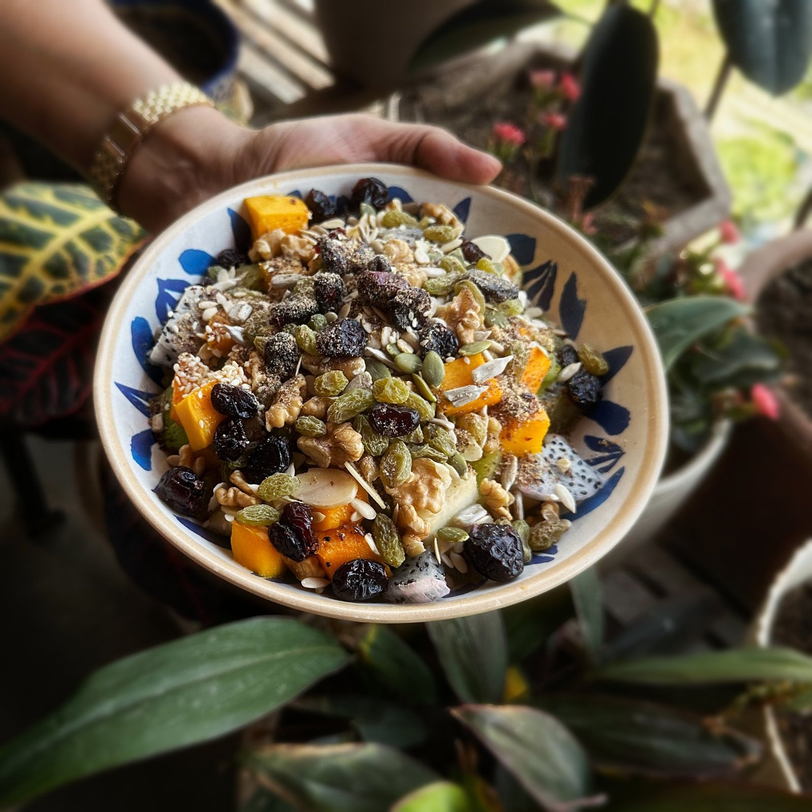 A Bowlsome® bowl held with care